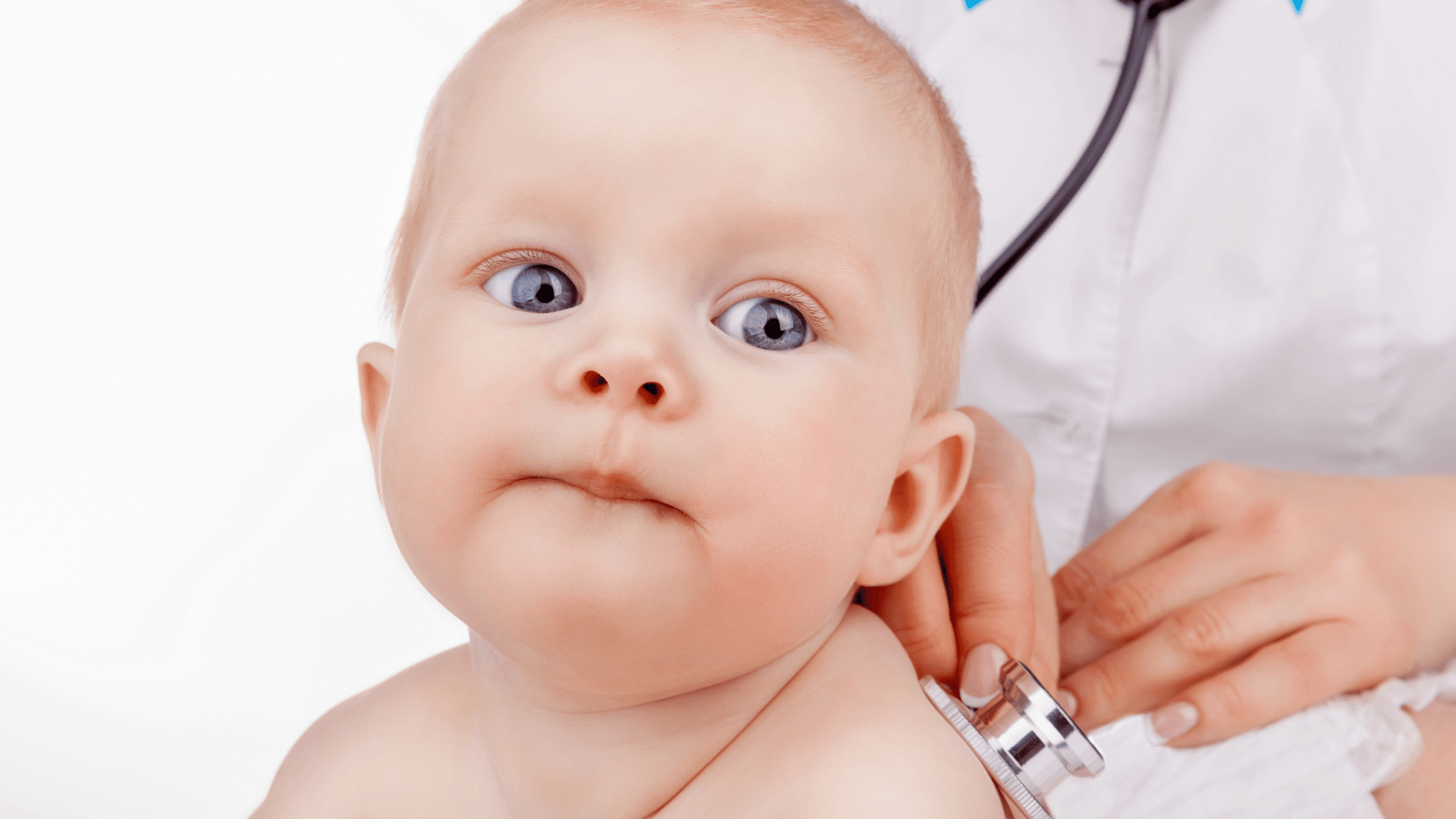 A Med/Peds resident listening to the heart of a baby using a stethoscope.