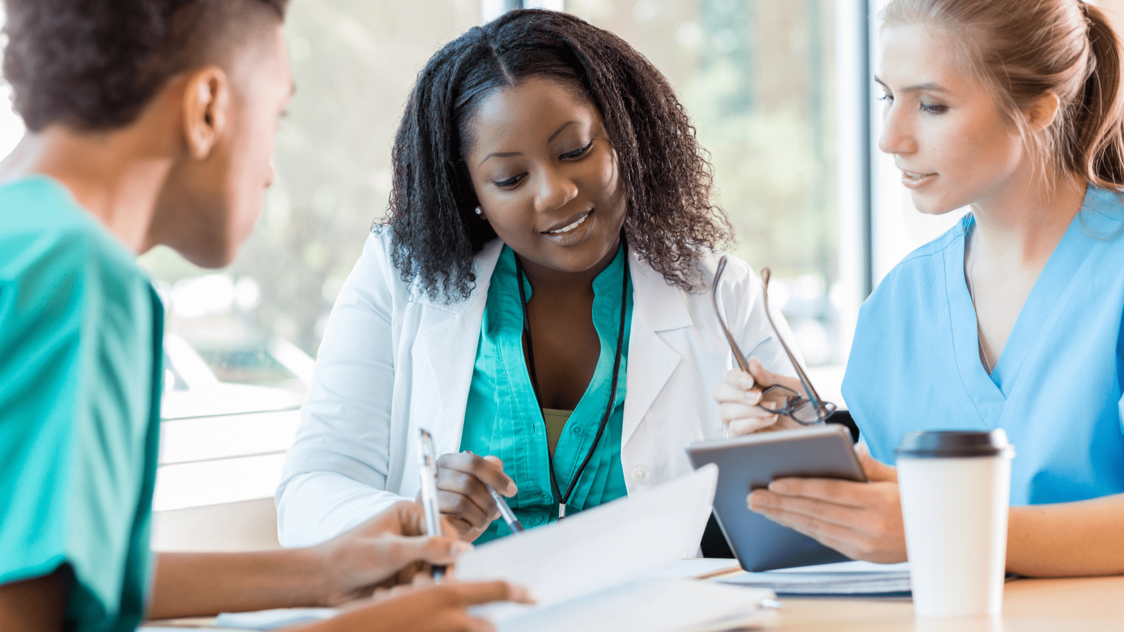 A group of medical students studying for the COMLEX Level 1 exam.